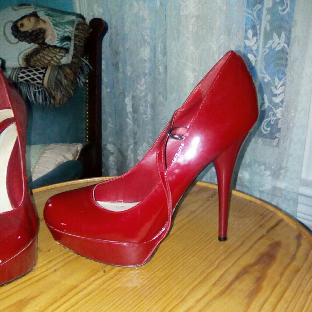 Steve Madden red patent leather pumps.
