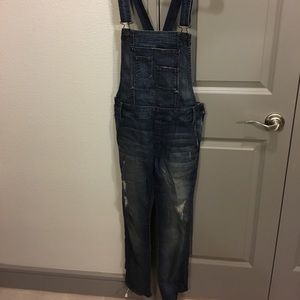 Sake Fifth Avenue distressed overalls.
