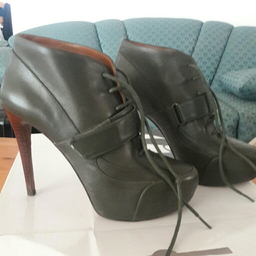 Olive green army leather bootie. 4" heel.