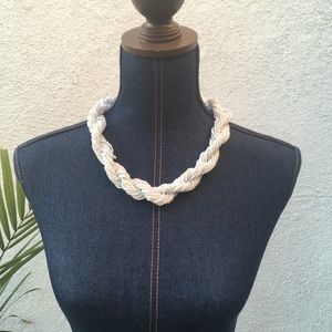 Beaded and twisted necklace