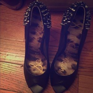 Black studded pumps