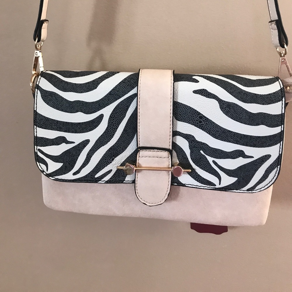 Cute zebra print and  pale pink/nude purse.