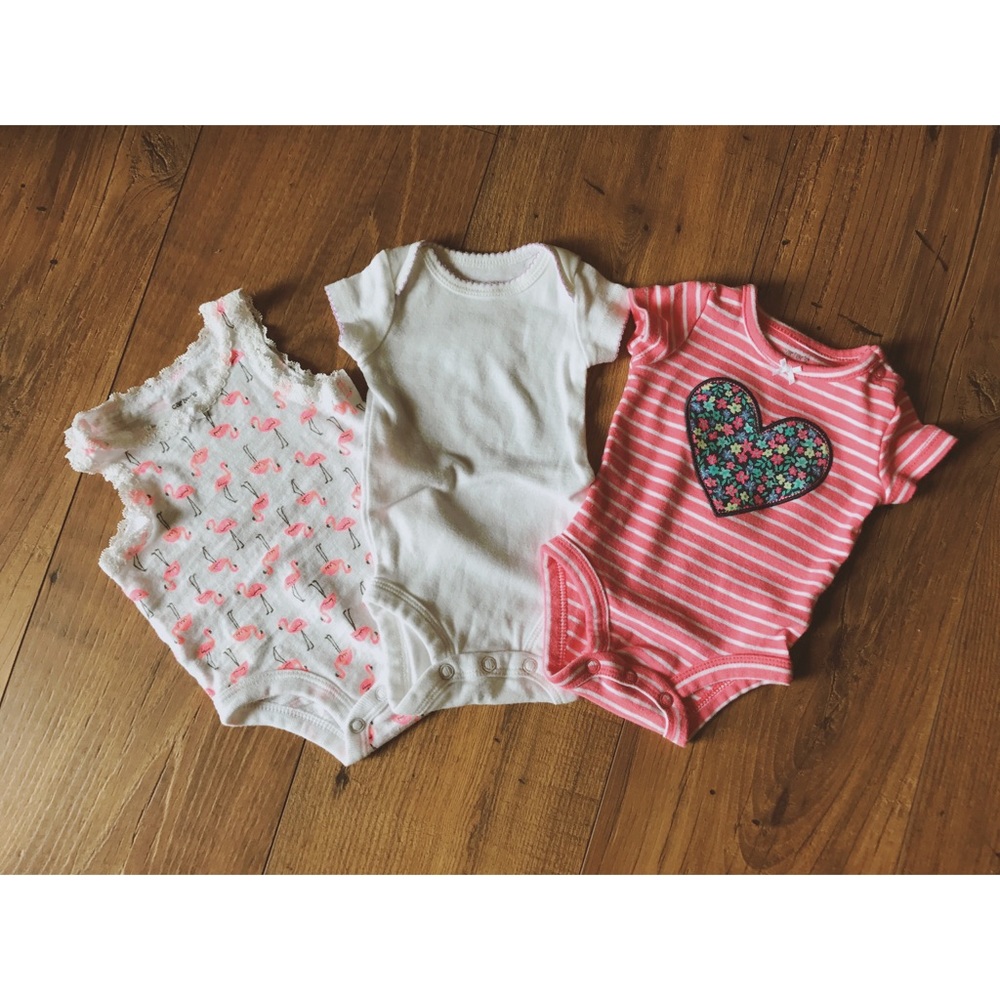 Three Newborn Carter's Onesies