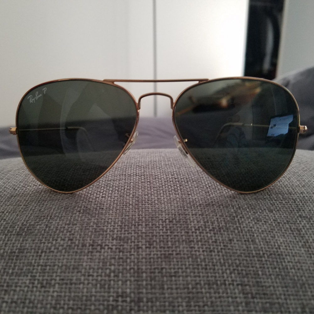 Gold RayBan aviator sunglasses