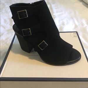 Suede open toe bootie with buckles on the sides