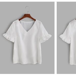 V-neck white ruffle sleeve top