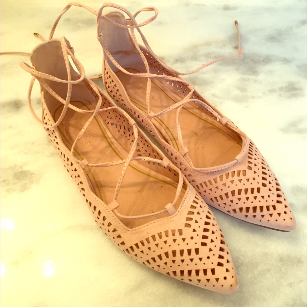 Perforated lace up flats
