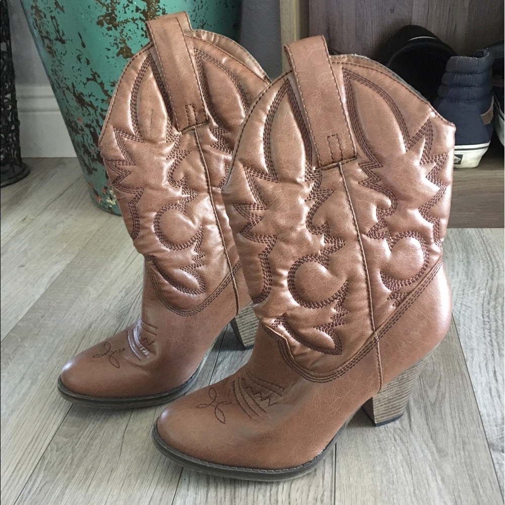 Brown cowboy boots.