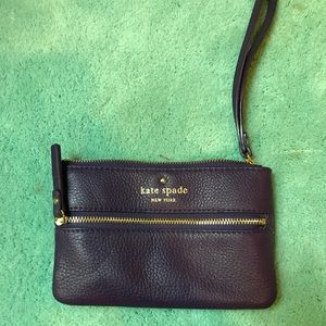 Purple Kate Spade wristlet