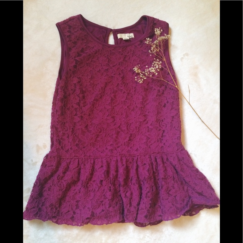 Sleeveless peplum shirt