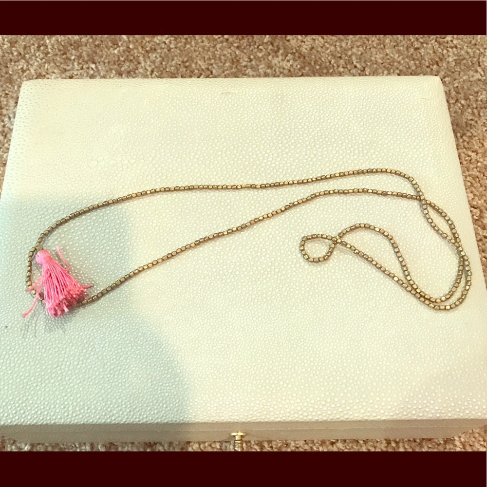 Gold necklace with tassel