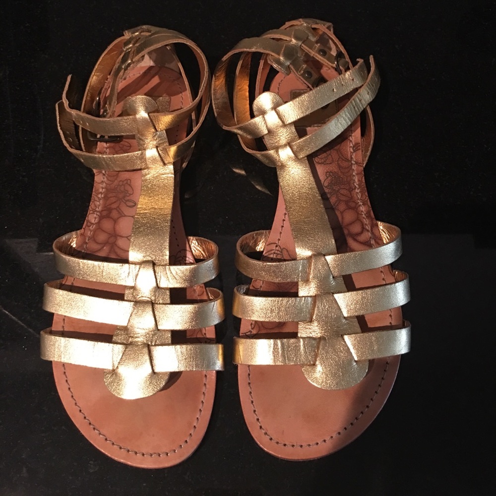 Gold leather gladiator sandals