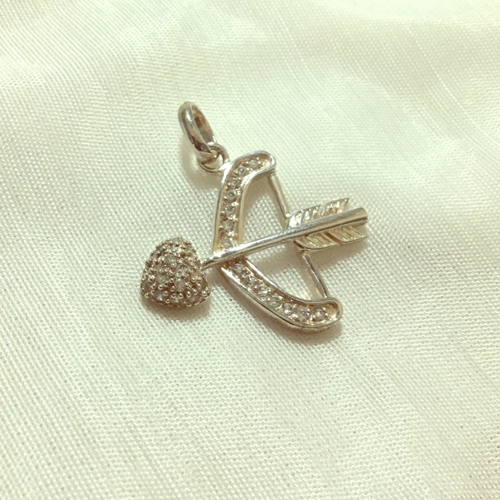 Silver tone charm, heart bow and arrow