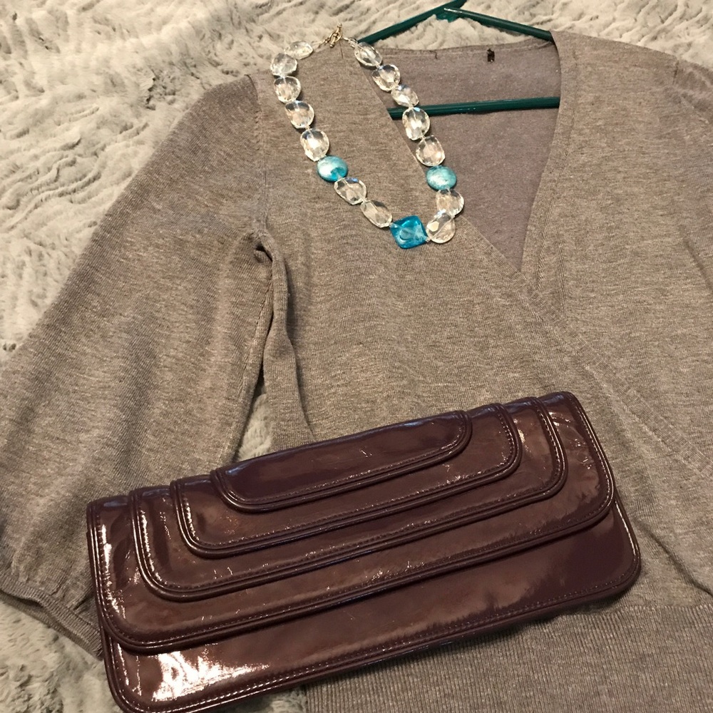 Gray cross body sweater