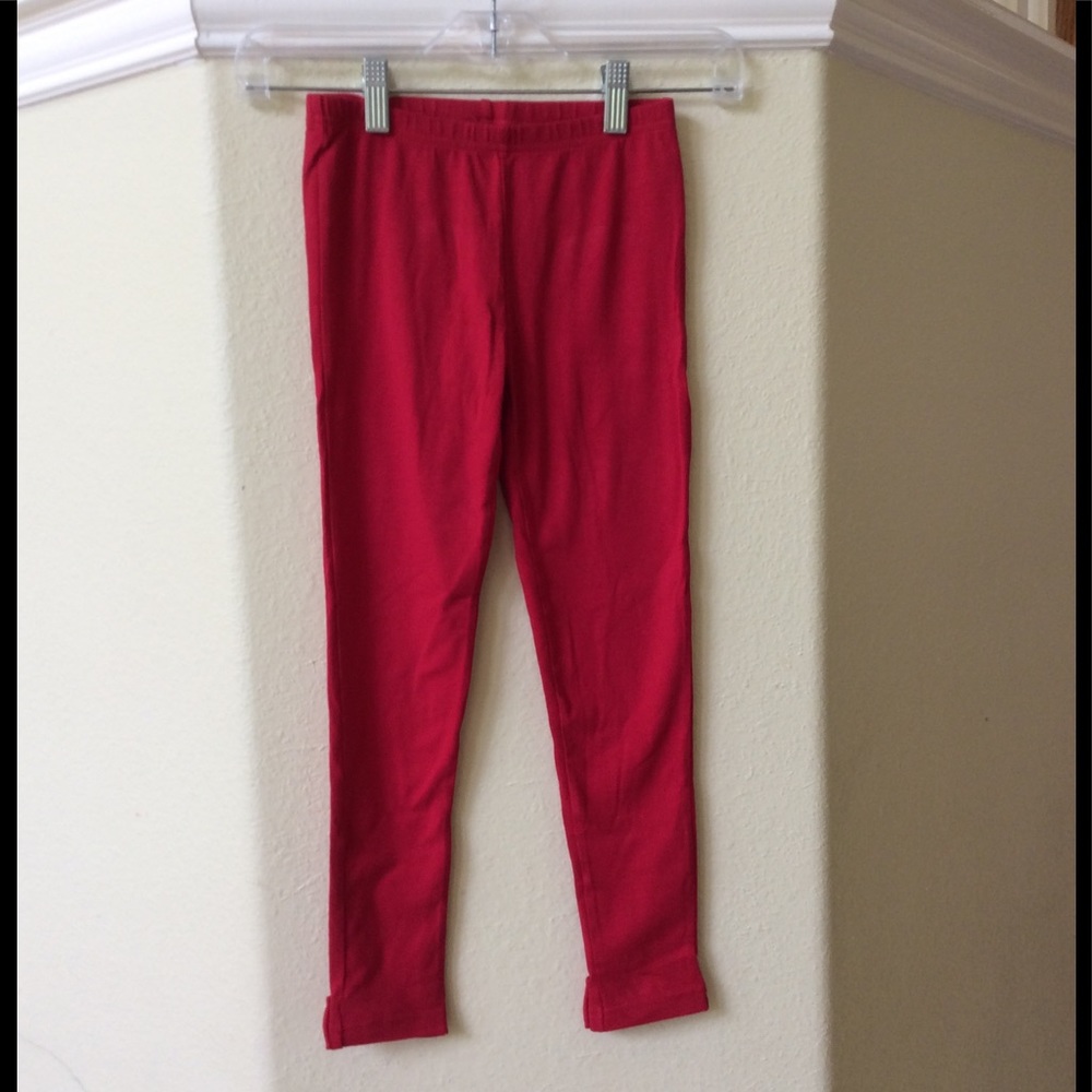 Red tights with embellished heart at ankle