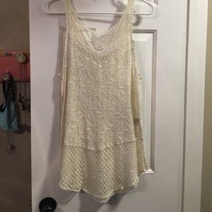 cream lacy tank.