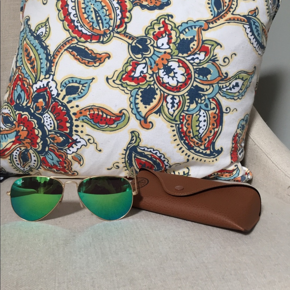 Green tinted Ray Bans
