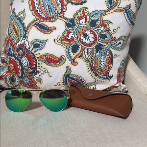 Green tinted Ray Bans