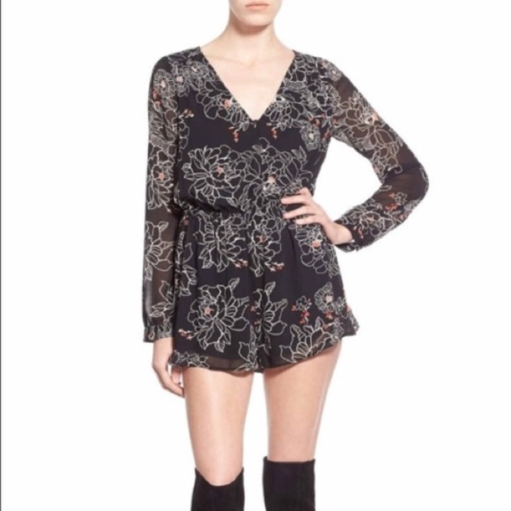 Black romper with floral design! Size S ASTR