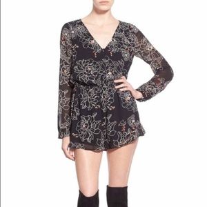 Black romper with floral design! Size S ASTR