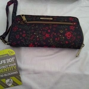 Travelon RFID wallet. Brand New with box and tag.