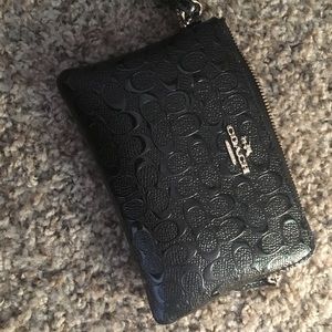 Black leather coach wristlet