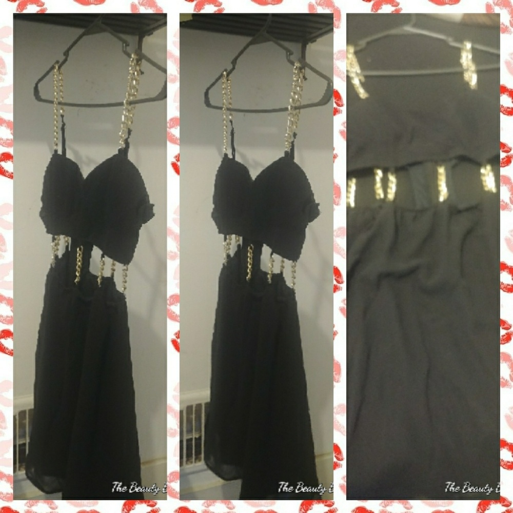 Black Stunning evening dress with stylish chains.