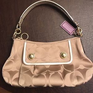 Coach bag with gold accents.  Like new!