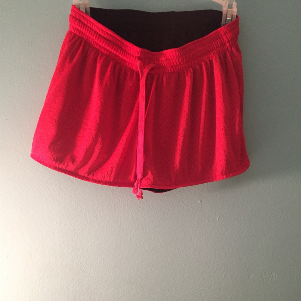 Reversible black and red gym shorts