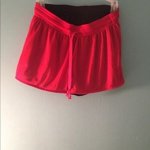 Reversible black and red gym shorts