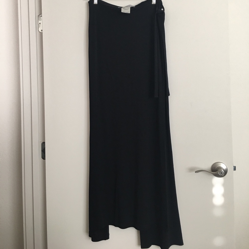 Black stretchy rayon wide leg pants w skirt flap