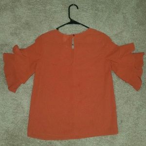 Womens blouse with ruffled sleeve