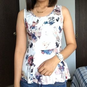 Sleeveless floral peplum top