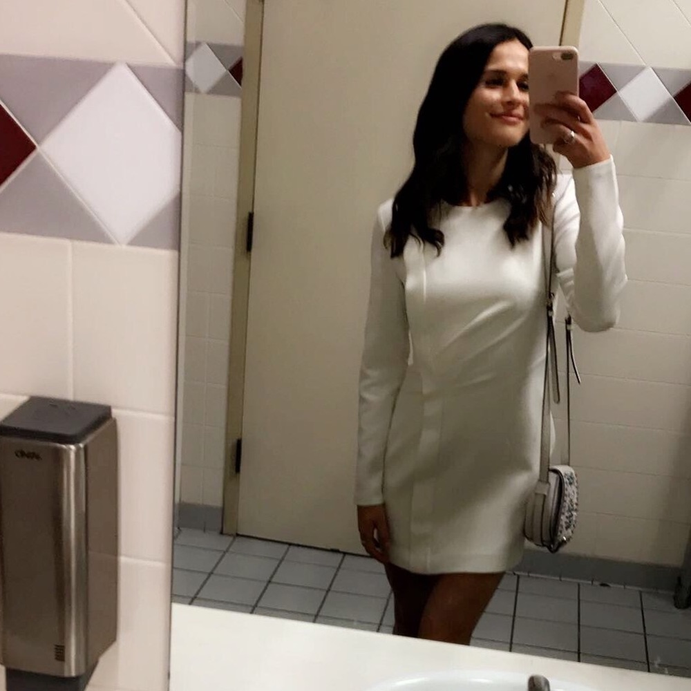 Elegant Keepsake white long sleeve dress.