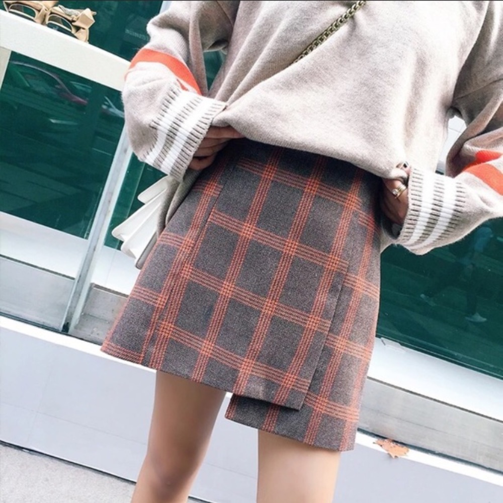 Plaid school girl skirt with tartan/ plaid detail.