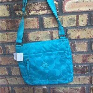 Turquoise Coach cross body bag