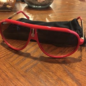 Red sunglasses never worn
