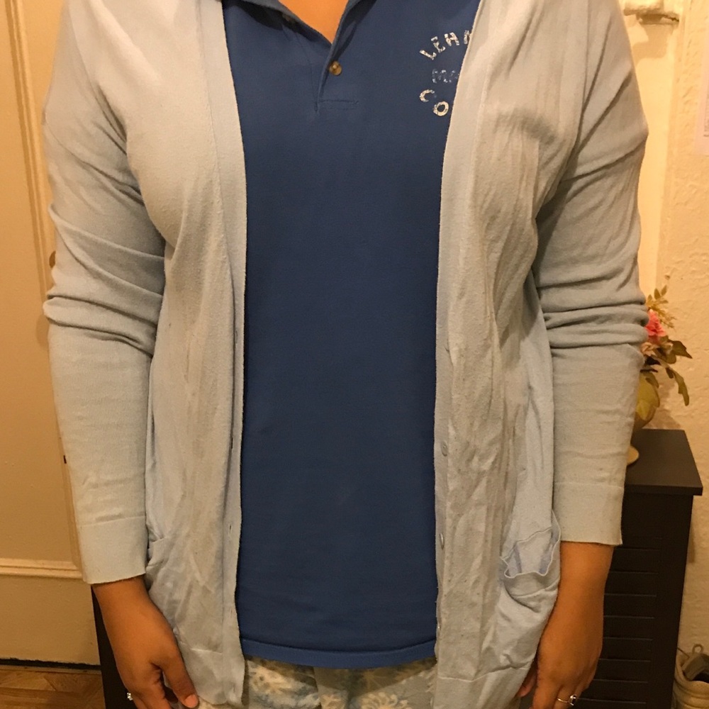 Long baby blue cardigan.