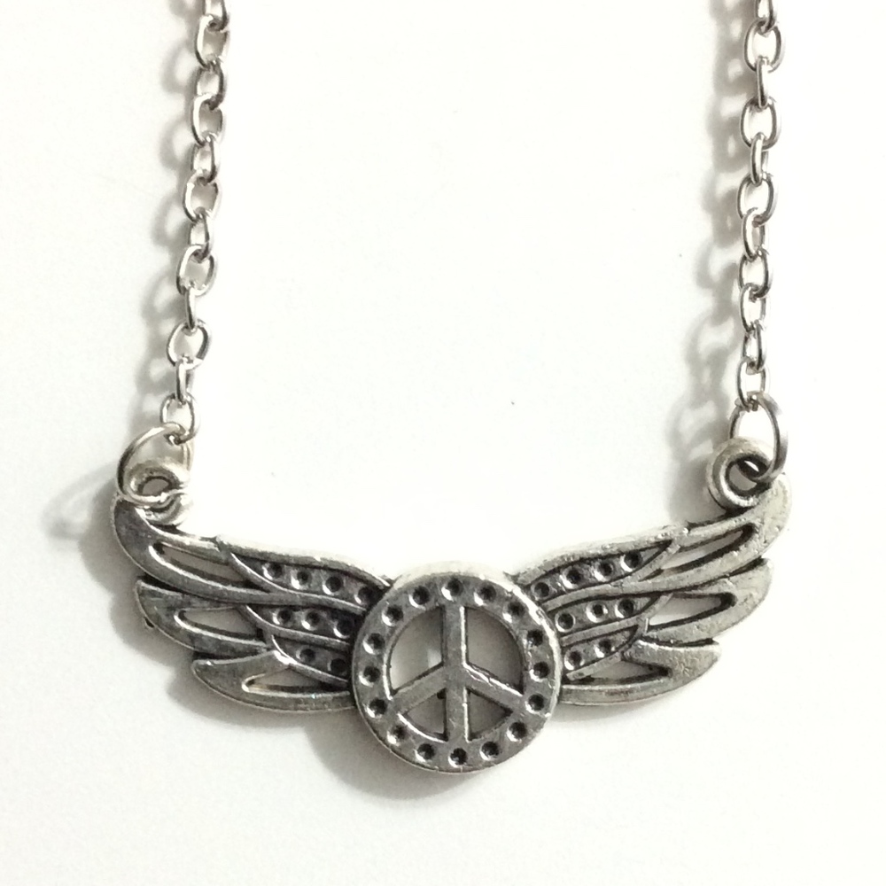 NEW Peace sign with wings necklace