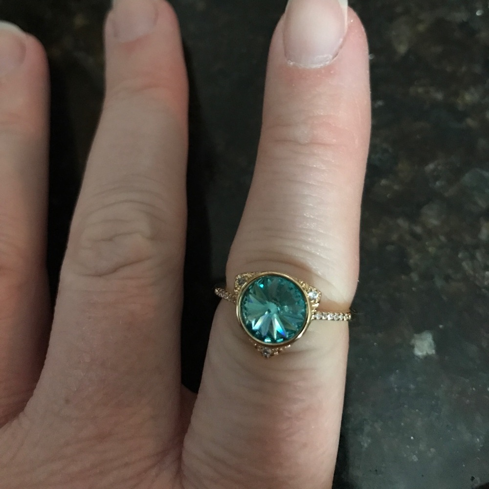 Light blue and clear stones in this ring