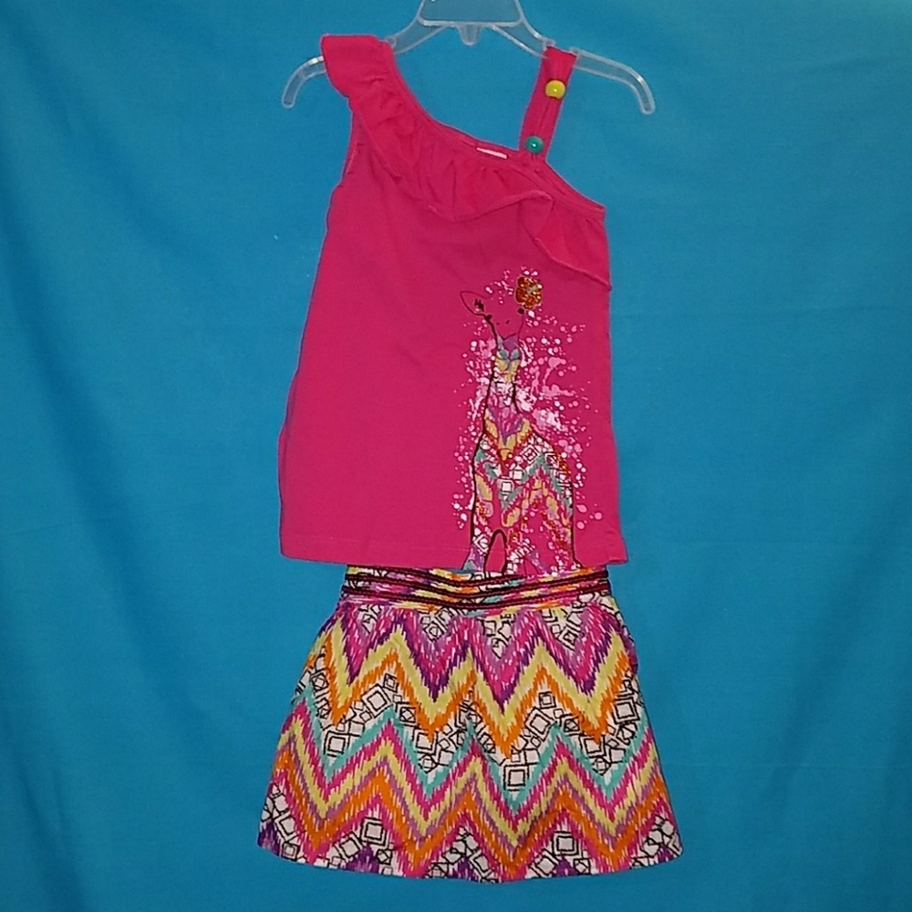 Matching pink giraffe set with multicolor skirt.