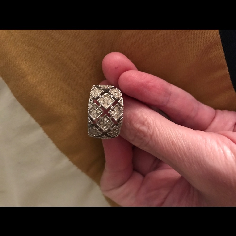 Size 8-9 silver cocktail ring with crystals.