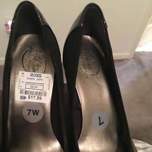 Black heels **never been worn**