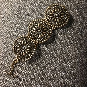 Gold medallion bracelet