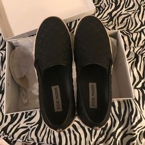 Steve Madden black slip ons