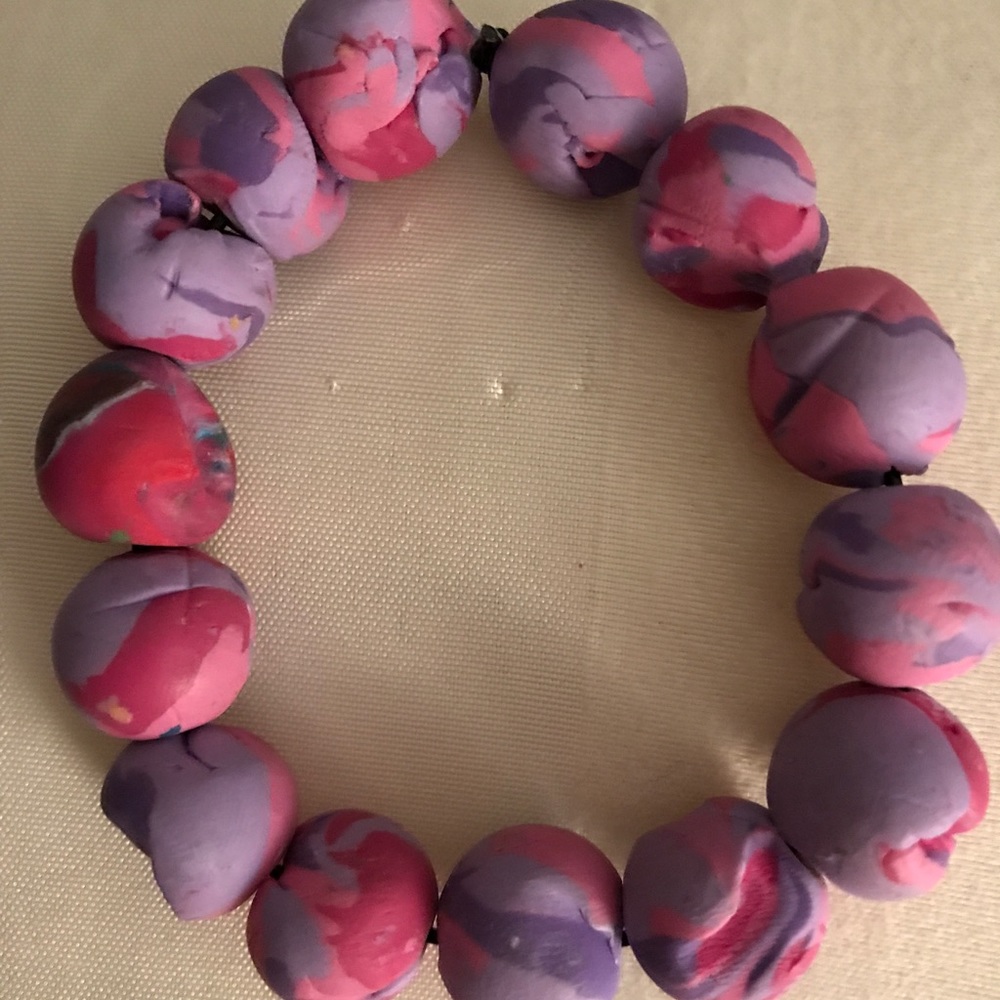 Purple and pink clay bracelet. Made by a local.