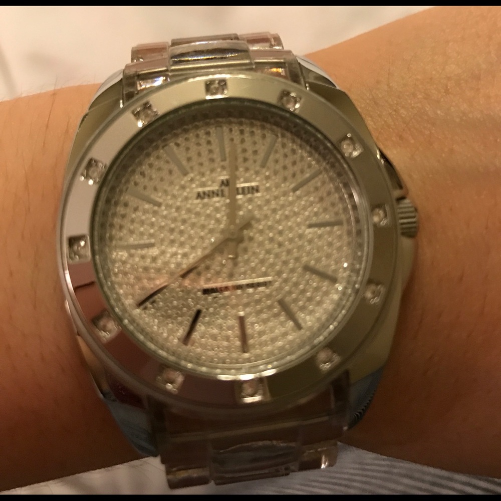 Anne Klein watch clear & silver in color