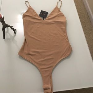 Nude body suit by J LUX LABEL