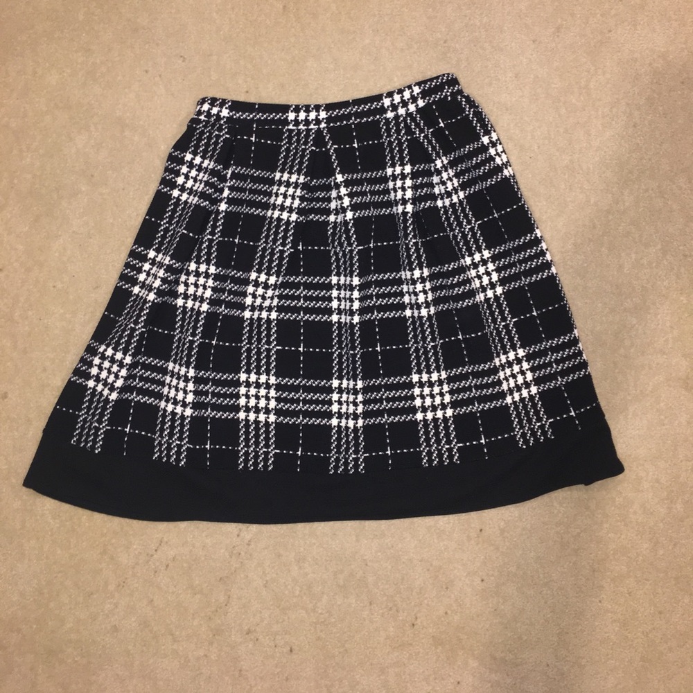 Plaid, pleated skirt worn twice