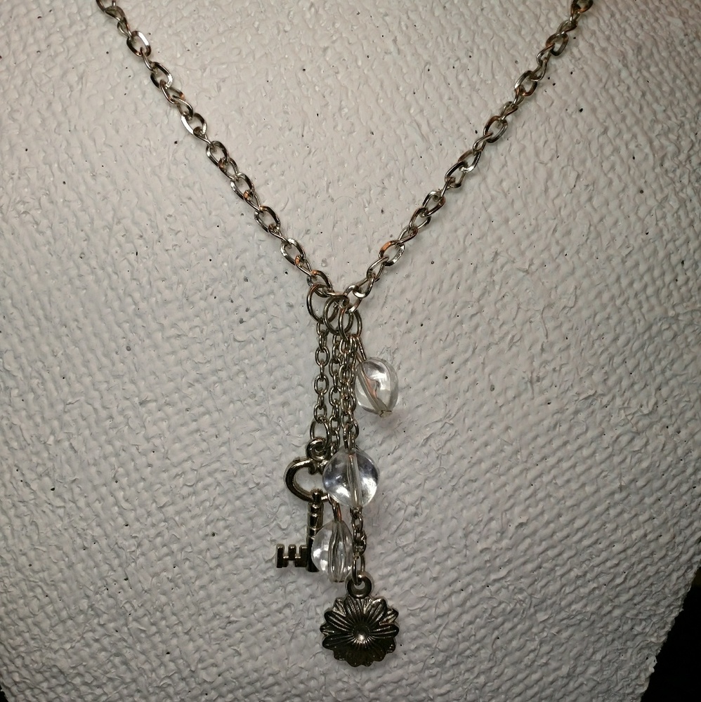 Flower and key dangle necklace.